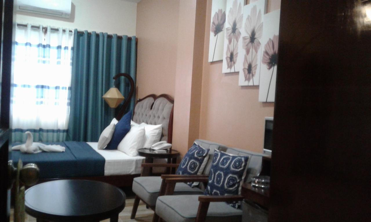 Charos Dormitel Hotel Dumaguete City Exterior photo